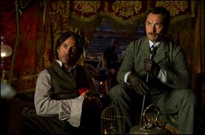 Robert Downey, Jr., left, and Jude Law star as Sherlock Holmes and Dr. Watson in 'Sherlock Holmes: A Game of Shadows,' which was released on DVD and Blu-ray on Tuesday.