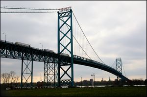 Lawmakers attempted to prevent Mich. Gov. Rick Snyder from using state money to build another bridge linking the state to Canada.