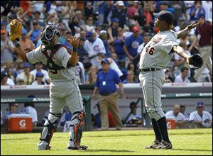 Detroit Tigers relief pitcher Jose Valverde, right, celebrates with catcher Gerald Laird after their 5-3 win over the Chicago Cubs in an interleague baseball game on Thursday.