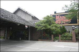 Steakhouses such as Toledo's Mancy's are the opposite of sushi places that pull down a city's manliness rating.