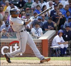 Detroit Tigers' Austin Jackson hits a two-run home run off Chicago Cubs relief pitcher Shawn Camp during a game last Thursday.