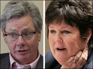Commissioners Pete Gerken, left, and Tina Skeldon Wozniak.