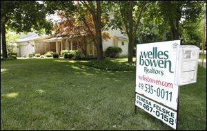The Ohio Association of Realtors report says 753 Toledo area homes sold in May, and the average price rose almost 7 percent in a year.