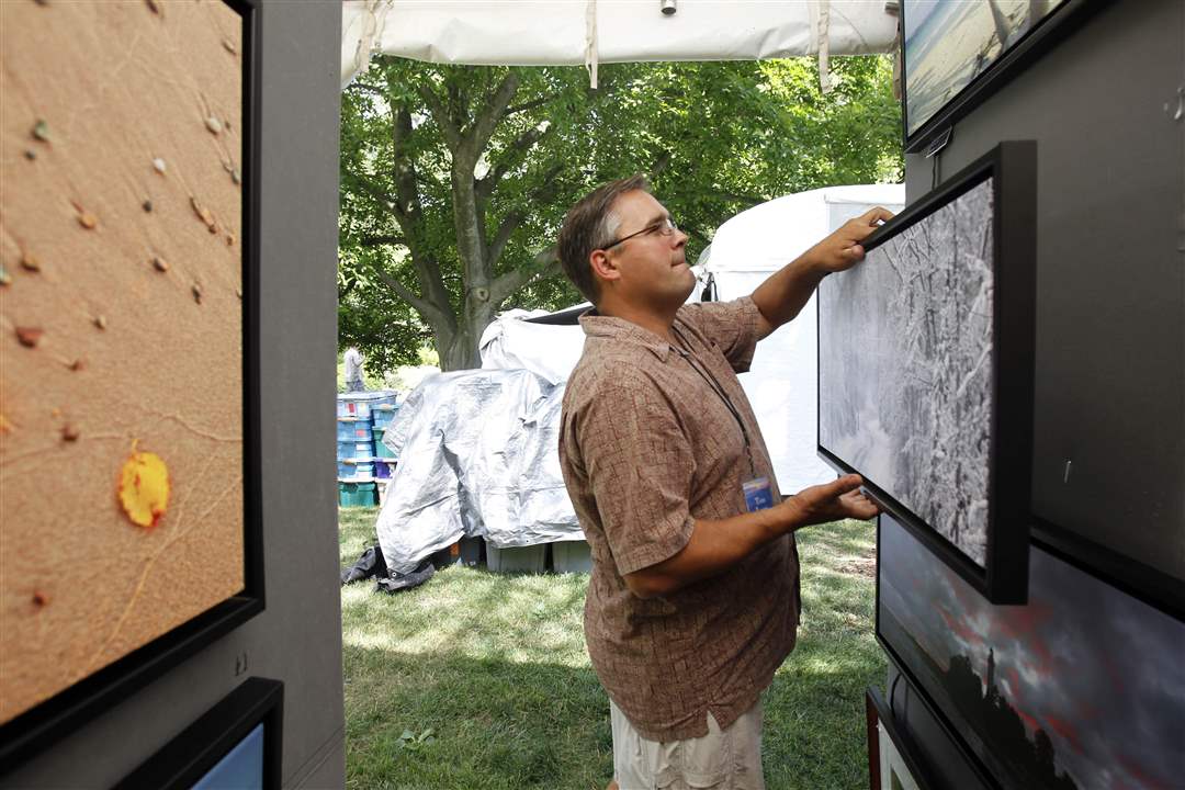 Artist-Tom-Lazar-puts-up-some-of-his-work