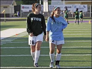Aly Marzonie, right, and Rachel Shellenback captain the New Trier High School soccer team in Illinois. There are more than 3 million girls who play high school sports.