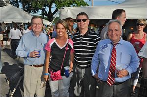 Enjoying the spectacular Summer Fest were John English, Megan Meyer Foos, and Toledo Councilmen Rob Ludeman, and George Sarantou.