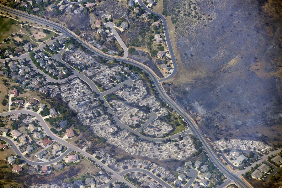 APTOPIX-Western-Wildfires-Mtn-Shadows