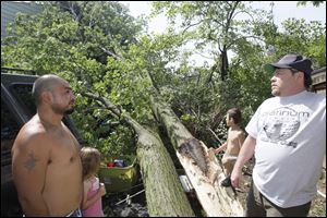 Rudy Ochoa, left, says he took shelter with his niece and nephew in a bathroom. The children's grandfather Jerry Eiseman, right, was not home during the storm. 
