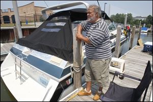 Arthur Taylor says he would be glad to pay the city of Toledo to use the Skyway Marina, but he is taking advantage of its being free.