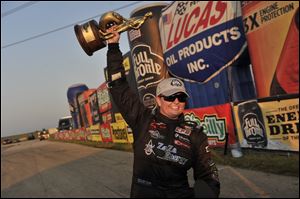 Erica Enders celebrates Sunday at the Route 66 NHRA Nationals in Joliet, Ill. She will be competing in Norwalk, Ohio, this week.