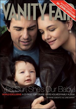 Tom Cruise, Katie Holmes, and baby Suri posed for the cover of Vanity Fair shortly after Suri was born in 2006.