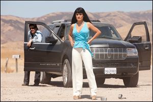 Salma Hayek plays Elena, leader of the ruling Mexican drug cartel, in 'Savages.'