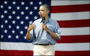 President Obama speaks to the crowd gathered at Washington Park for an ice cream social and speech in Sandusky.