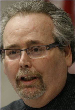 Republican board member Tony DeGidio.