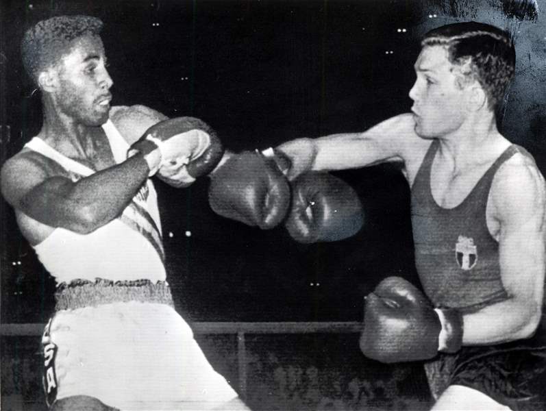 Wilbert-Skeeter-McClure-left-avoids-a-punch-from-Italy-s-Carmelo-Bossi
