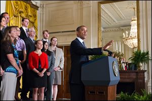 President Barack Obama lays out his plan to extend tax cuts for the middle class, during an announcement from the East Room of the White House.