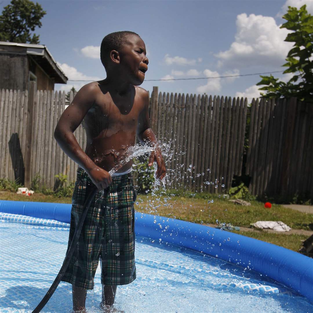 As-his-new-pool-fills-up-with-cold-water