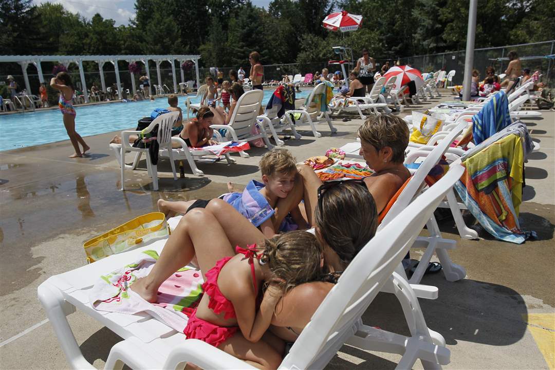 Aidan-McAlees-7-center-smiles-as-he-sits