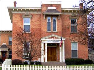 The newly approved legislation restores 75 percent of last year's Community Development Block Grant funding to the shelters Aurora House, pictured, Bethany House, La Posada, and Family House.