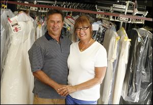 Gary and Suzi Sahadi are showing up to work everyday at Colonial Cleaners on Lewis Avenue, but only so their customers can pick up their drop-offs. The Sahadi family has owned the business since 1947.