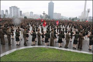 North Korean soldiers dance in the plazas of Pyongyang after North Korea announced that leader Kim Jong Un was granted the title of marshal.