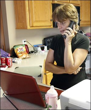 Lori Helppie, McKenna's grandmother, fields phone calls Wednesday from national media and people wanting to donate.