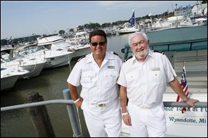 Vice Commodore Tim MacDonald and Power Fleet Captain Jim Fuhr, both of the Associated Yacht Club, at the Ottawa River Yacht Club in Point Place during the annual regatta.