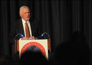 Former astronaut Neil Armstrong speaks at the ceremony commemorating the opening of the Discovery Channel Telescope.