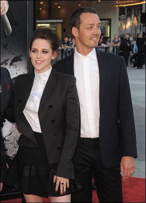 Kristen Stewart and director Rupert Sanders attending the 