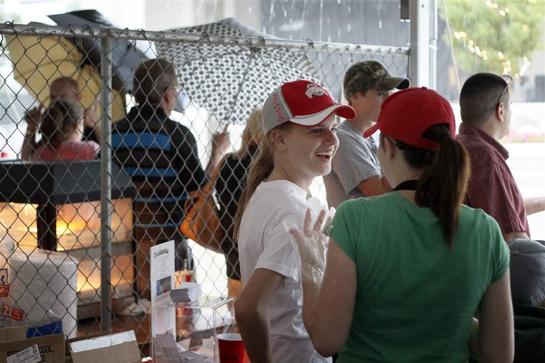 Nichole-Hornik-14-left-laughs-with-her-friend-Bailey-Nye