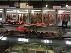 The butcher shops in Little Poland are filled with hams, hocks, and sausages.