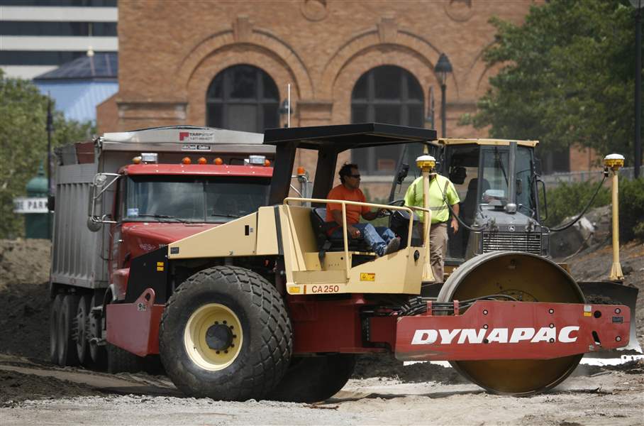 Equipment-rolls-through-the-area-near-the-former-steam-plant