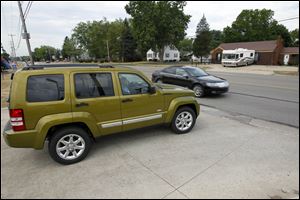 A 2011 Liberty is taken for a test drive at the Monroe Dodge Chrysler Jeep Ram Superstore in Monroe.