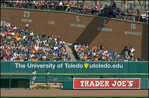 A 52 feet-by-3 feet advertisement with the University of Toledo's Web site domain name stretches across a wall behind the visitor's right-field bullpen at Detroit's Comerica Park. UT dished out $125,000 to the Tigers this season in an effort to attract more students from southeastern Michigan.