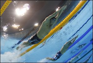 Ryan Lochte, left, lost the lead as the anchor leg as France chased down the United States -- and Lochte, no less -- to win another riveting relay at the Olympics.