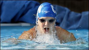 Ashley Hartung, practicing in her home pool, competed over the weekend in the Michigan statewide championship for swimmers 14 and under. She was ranked third in the state going into the event. 