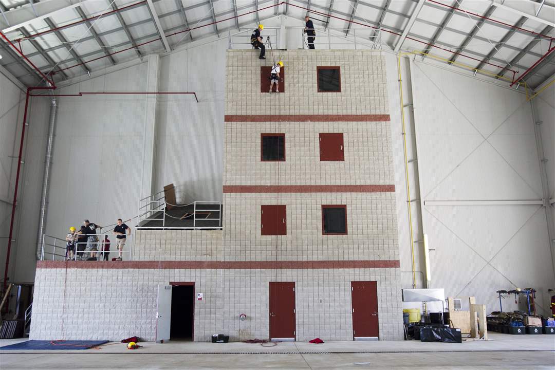 Ian-Black-11-of-Toledo-repels-down