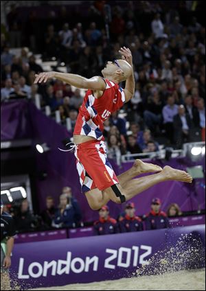 American Paul Dalhausser and his partner, Todd Rogers, moved to 2-0 at the London Olympics.