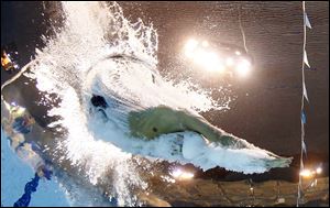 United States' Ryan Lochte starts in a men's 200-meter individual medley at the Aquatics Centre in the Olympic Park Wednesday.