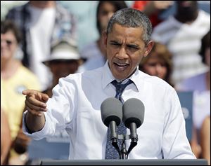 President Obama spent Wednesday visits to Mansfield and Akron criticizing a tax plan backed by Republican opponent Mitt Romney.