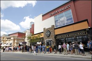 Dozens wait outside Westfield Franklin Park in Toledo to get inside the food court and ultimately to the Chick-fil-A counter to order food in support of the Appreciation Day suggested by former Arkansas Gov. Mike Huckabee.