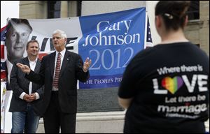 James Gray, Libertarian candidate for vice president, endorses a ballot initiative to define marriage in Ohio as 'a union of two consenting adults.' He spoke at a rally Saturday.