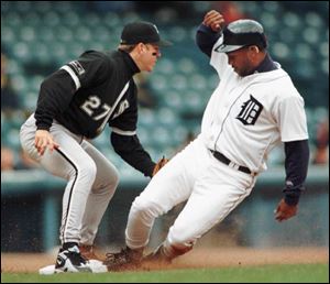 Curtis Pride, right, seen in this 1997 photo, played for both the Mud Hens and Tigers and will represent the U.S. as part of a delegation in the Olympic closing ceremony.