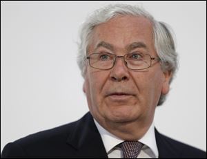Britain's Governor of the Bank of England Mervyn King wrote in a newspaper editorial Sunday that the London Olympic showed it was wrong to argue that massive bonuses were needed to motivate people to do well. King said the success of Olympians and the pride of the 10,000 volunteers at the games showed that 