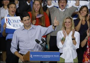 Vice presidential running mate Rep. Paul Ryan, R-Wis, gives the thumbs at his  a welcome home rally Sunday in Waukesha, Wis.