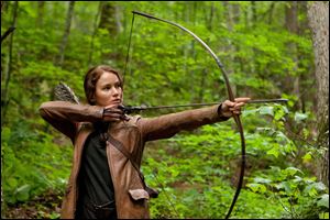Jennifer Lawrence portrays Katniss Everdeen in a scene from 'The Hunger Games.'