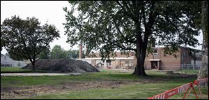 The construction project at Little Flower of Jesus Catholic Church and St. Benedict School is scheduled to be finished by December. Rudolph/Libbe Inc. of Lake Township is the general contractor for the work, which will add 2,200 square feet of office space.