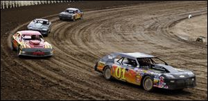 UNOH student and racing team member Ryan O'Dette, front, races recently at Limaland Motorsports Park. UNOH revived its athletic program in 2007, adding its motorsports team as one of 10 varsity sports.