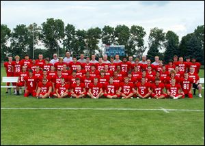 FROM LEFT: Row 1: Matt Trapp, Zack Linhart, Tyler McCrory, Brent Schlumbohm, Preston Link, Jacob Rahe, Brennan Seifert, Zach Ross, Josh Harper Row 2: Grant Geiser, Jack Heckman, Trevor Shultz, Ryan Mang, Montrece Cole, Caleb Tussing, Devin Snowden, Tommy Mann, Chris Orcutt, Zach Thompson, Noah Zatko, Jonathan Bowlus Row 3: Adam Krukemyer, Brad Radabaugh, Skylar Dierker, Blake Kohring, Jordan Randall, Garrett Leuck, Isaiah Conkle, Zach Coffield, Adam Wolf, Derick Buchman, Logan Bess, Tim Bell Row 4: Jake Schmeltz, Enrique Miranda, Eli Brown, Hunter Sutton, Mitchell Davidson, Michael Flipse, Lucas Friess, Jake Radabaugh, Ian Maytham, Garrett Ballard, Abe Reyes, Brandon Vollmar, Ben Haas, Jason Fertig, Joey Salinas Row 5: Michael Glaze, Andrew Blair, Shane VanVorce, assistant coach Joe Wyant, assistant coach Andy Friess, assistant coach Jeff Rutherford, assistant coach Eric Rutherford, head coach Jerry Rutherford, assistant coach Craig Rutherford, assistant coach Glenn Owens,assistant coach Rick Keyes, assistant coach Nick Schmeltz, Jakob Skriba, Brad Hoy