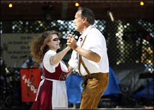 Dawn Krupinsky, left, and her husband Walter Krupinsky of St. Clair Shores, Mich., dance a polka.